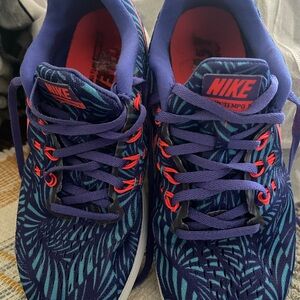 Nike Purple and Teal Running Shoes with Coral Accents